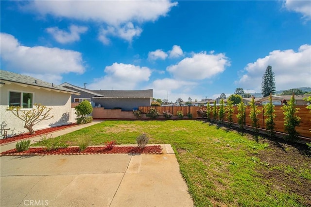 view of yard featuring a fenced backyard
