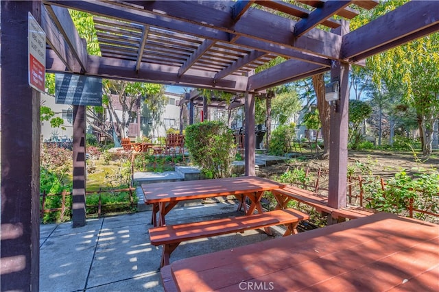 view of patio / terrace featuring outdoor dining area and a pergola