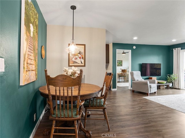 dining space featuring recessed lighting, baseboards, a ceiling fan, and dark wood-style flooring