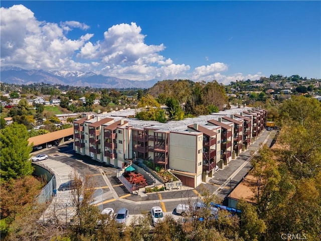 bird's eye view with a residential view and a mountain view