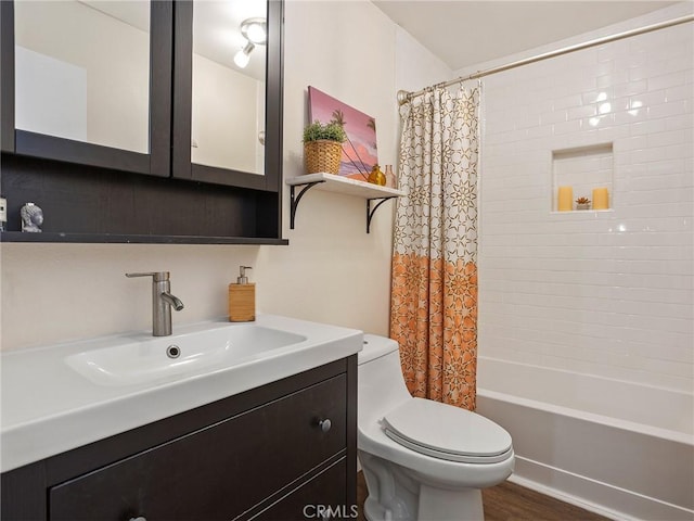 bathroom with shower / bath combination with curtain, toilet, vanity, and wood finished floors