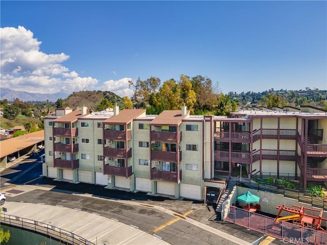 view of building exterior with a mountain view