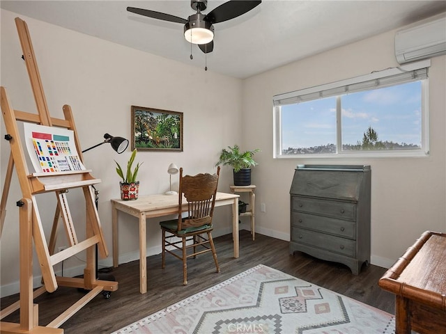 office featuring a ceiling fan, wood finished floors, baseboards, and a wall mounted AC