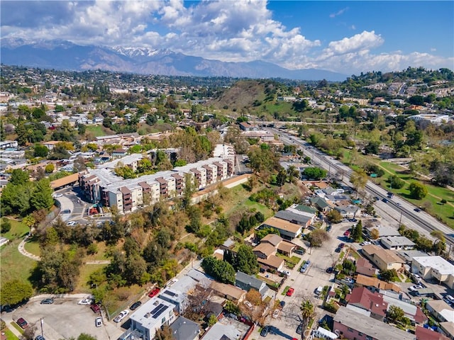 aerial view with a mountain view and a residential view