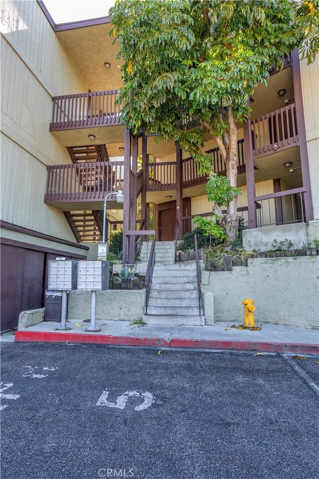 view of building exterior featuring stairway