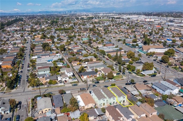 birds eye view of property with a residential view