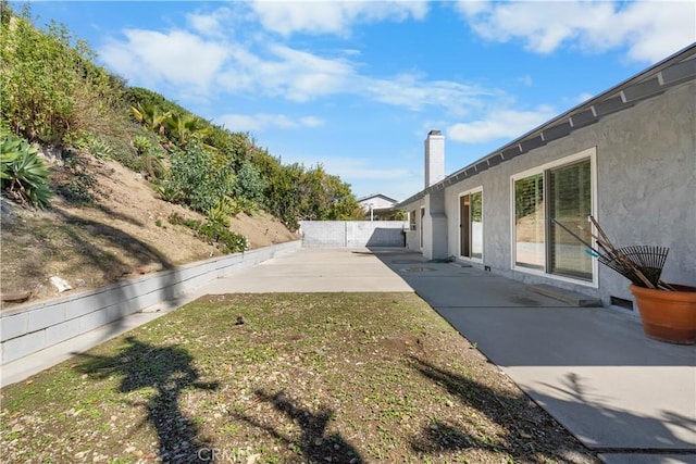 view of yard with a patio area and fence