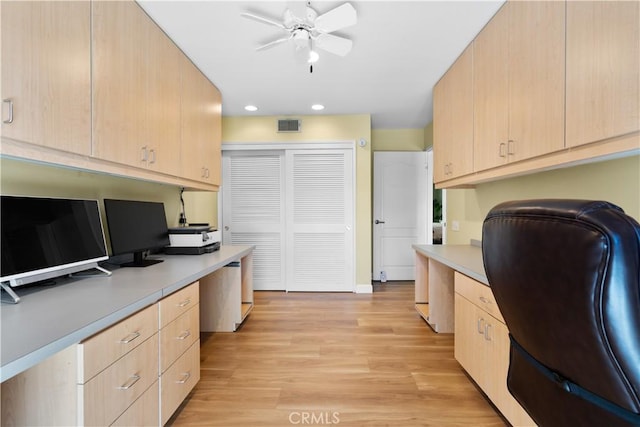 office area with a ceiling fan, visible vents, built in study area, recessed lighting, and light wood-style floors