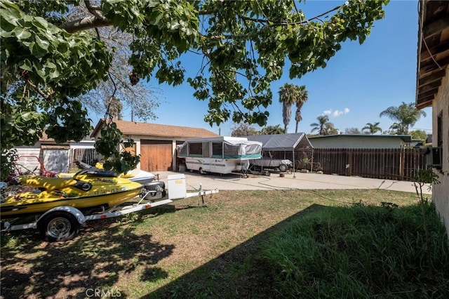 exterior space with a patio and fence