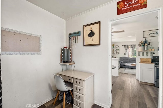 office area featuring dark wood finished floors and baseboards