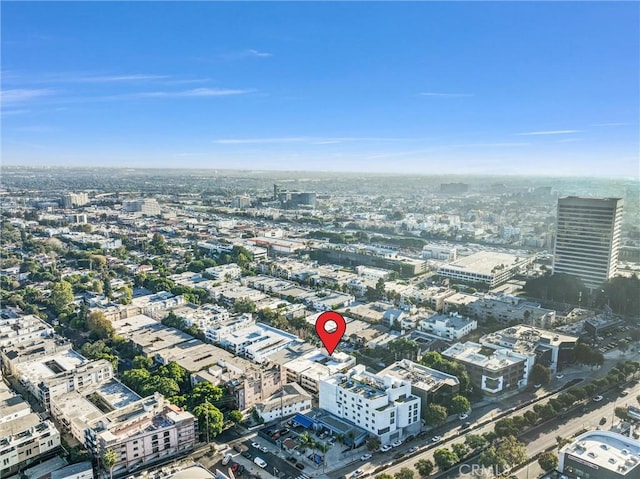 drone / aerial view featuring a city view