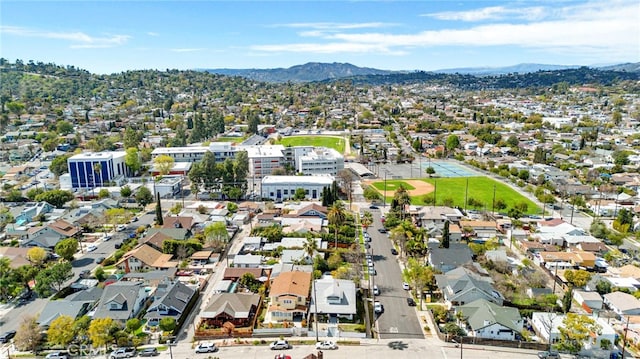 drone / aerial view with a mountain view and a residential view