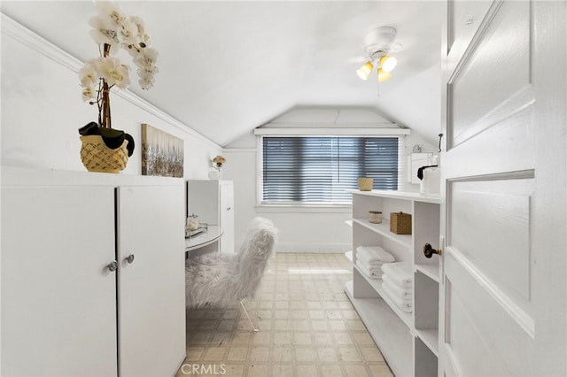 bathroom featuring tile patterned floors, a ceiling fan, and lofted ceiling