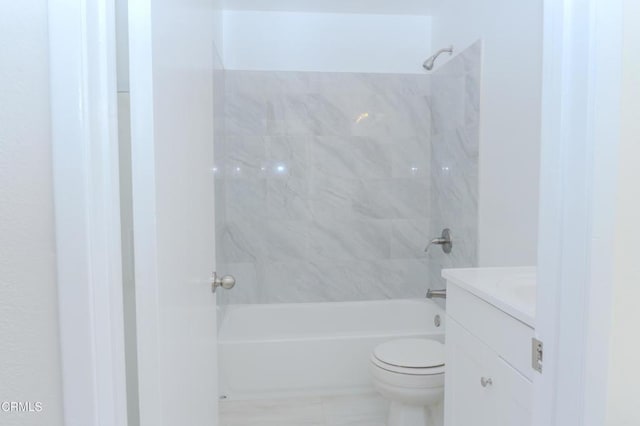 full bath featuring toilet, bathtub / shower combination, and vanity