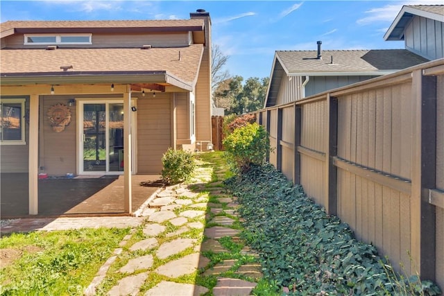 view of yard featuring fence