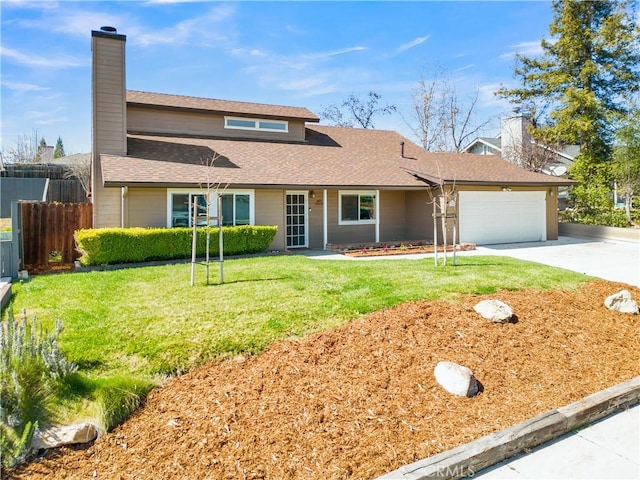 view of front facade with a front lawn, driveway, fence, a garage, and a chimney