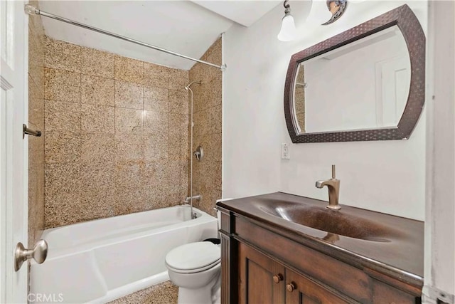 bathroom with vanity, toilet, and shower / bathtub combination