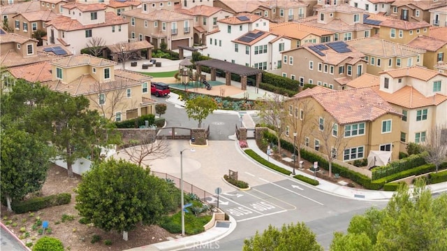 birds eye view of property with a residential view