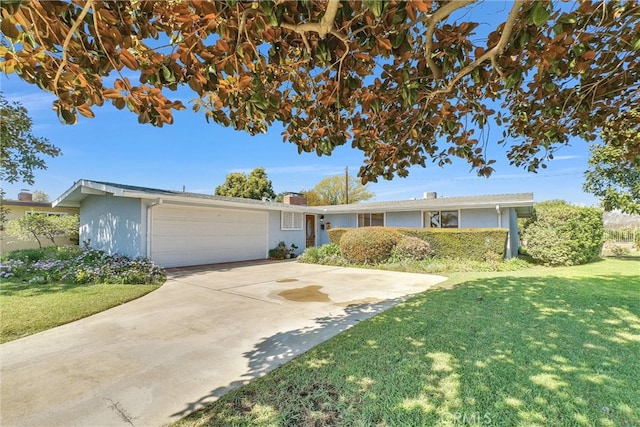 single story home with stucco siding, driveway, a front lawn, an attached garage, and a chimney