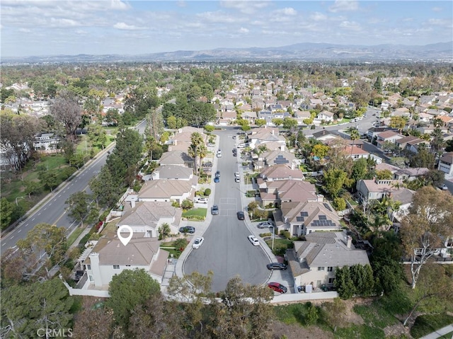 bird's eye view with a mountain view and a residential view