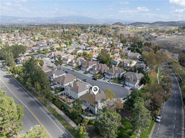 aerial view featuring a residential view and a mountain view