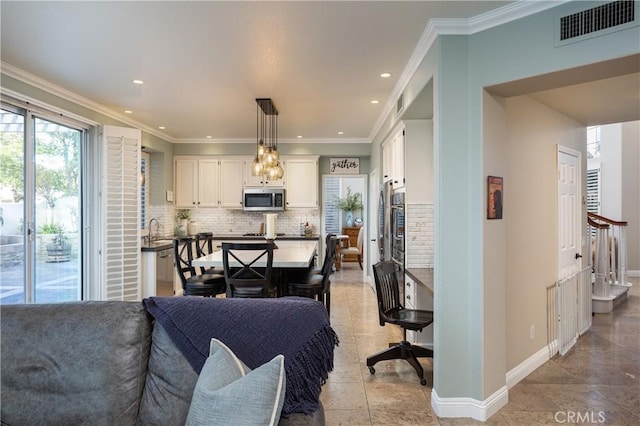 living room with visible vents, baseboards, stairway, ornamental molding, and recessed lighting