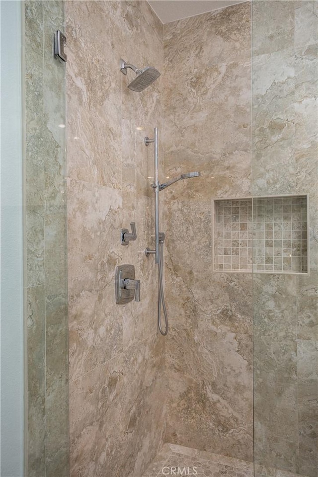 details featuring a tile shower