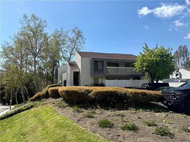 view of front of house featuring stucco siding