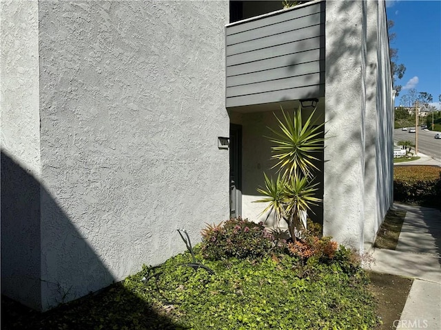 exterior space featuring stucco siding