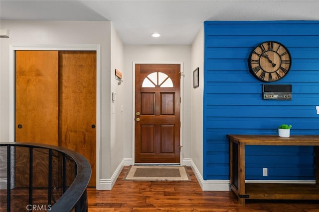 entrance foyer featuring recessed lighting, baseboards, and wood finished floors