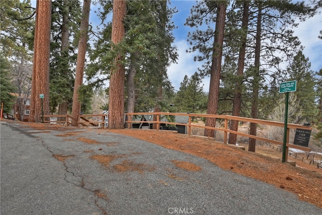 view of street featuring a gate