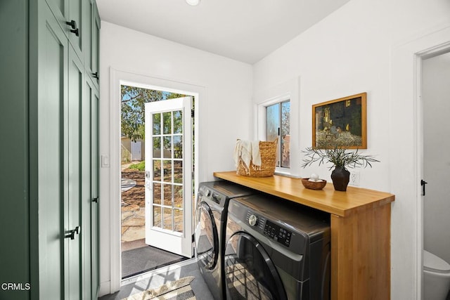 laundry room with laundry area and separate washer and dryer