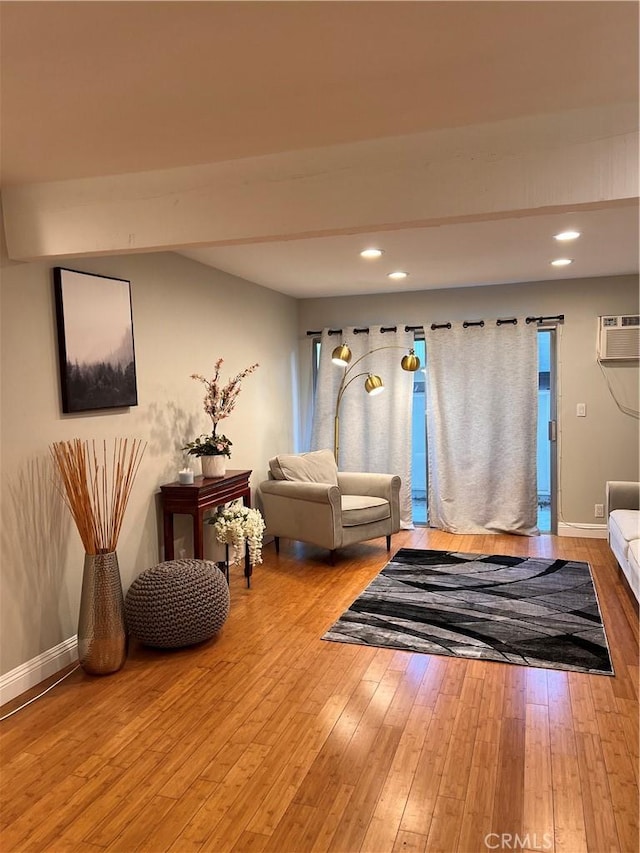 interior space featuring recessed lighting, baseboards, and hardwood / wood-style flooring