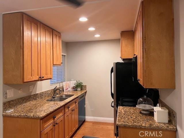 28947 Thousand Oaks Blvd Unit 134, Agoura Hills, CA 91301 - kitchen featuring stainless steel dishwasher, light wood finished floors, recessed lighting, and light stone countertops