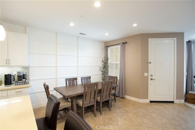 dining space with visible vents, light tile patterned floors, recessed lighting, and baseboards