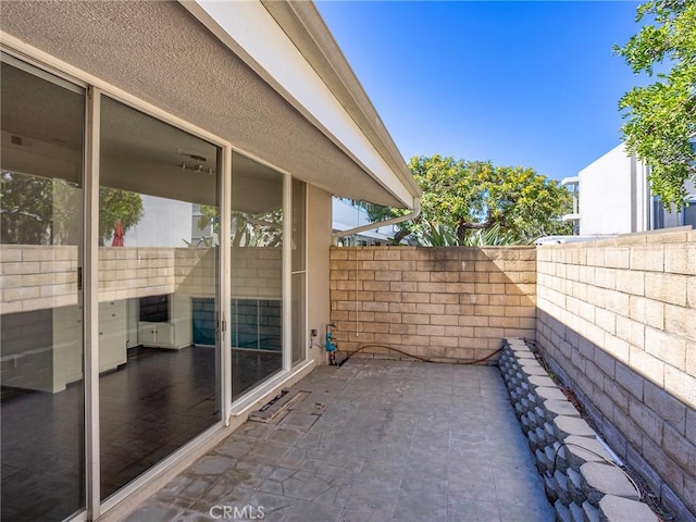 view of patio / terrace with fence