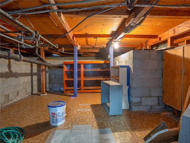 unfinished below grade area with tile patterned floors