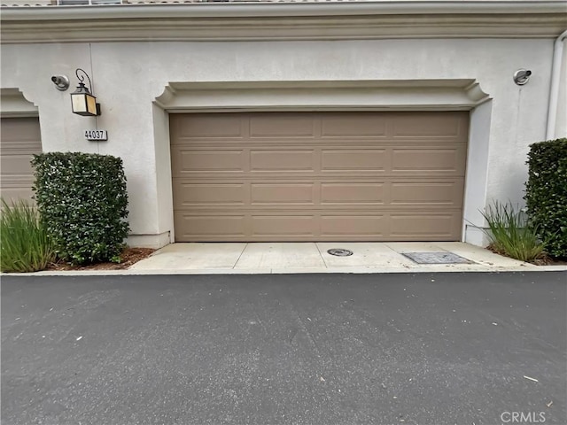 garage with driveway