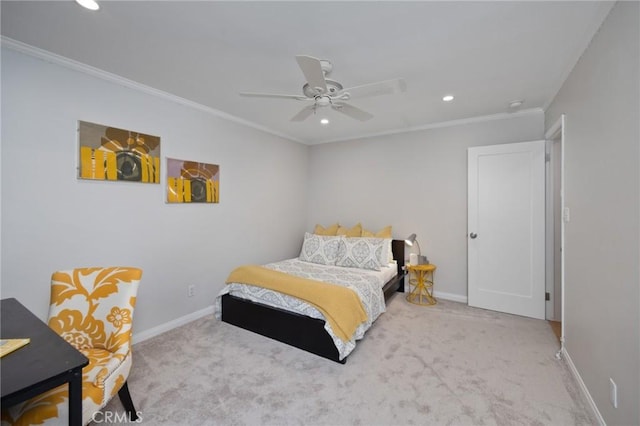 carpeted bedroom featuring a ceiling fan, recessed lighting, baseboards, and ornamental molding