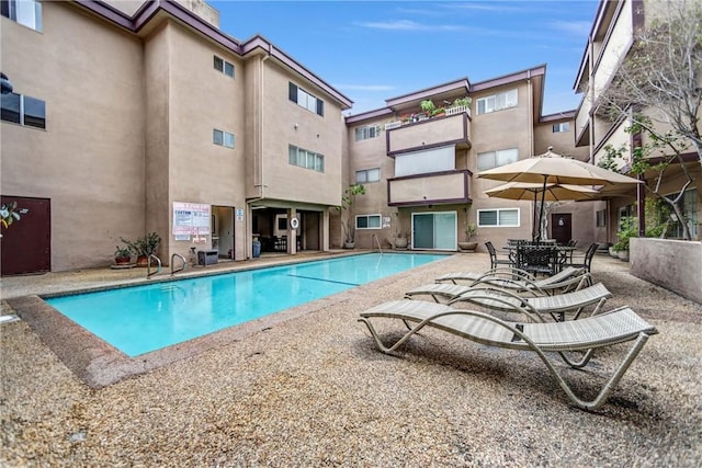 pool featuring a patio area