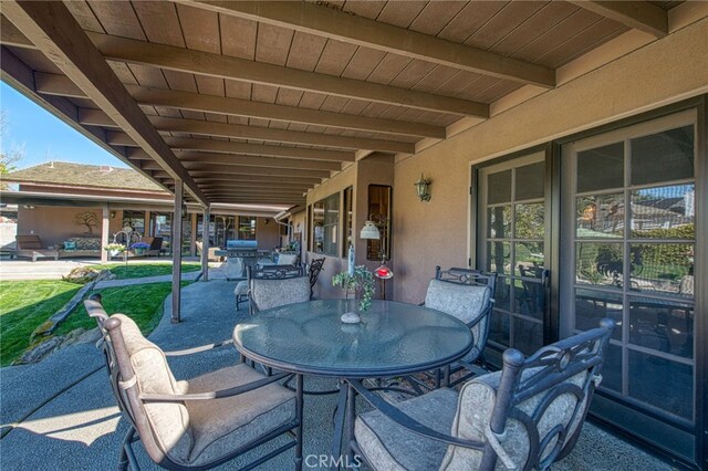 view of patio featuring outdoor dining space