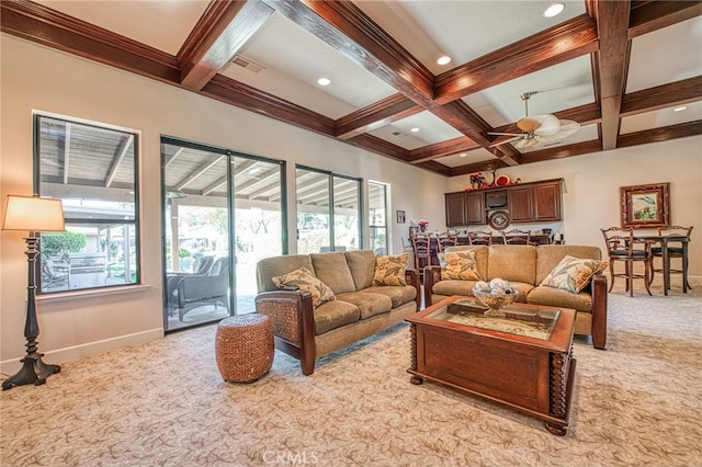 living area with light carpet, visible vents, coffered ceiling, and beam ceiling