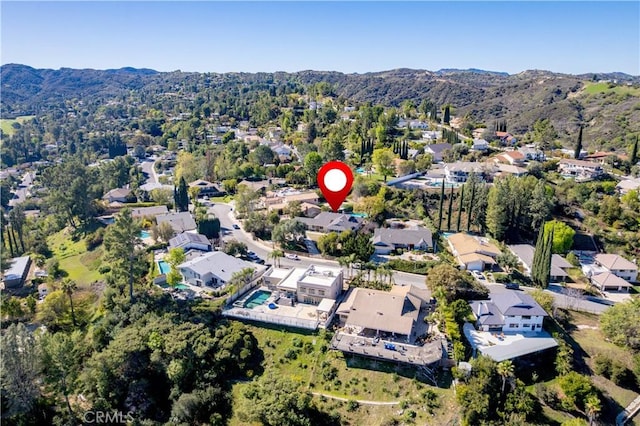 drone / aerial view with a mountain view and a residential view