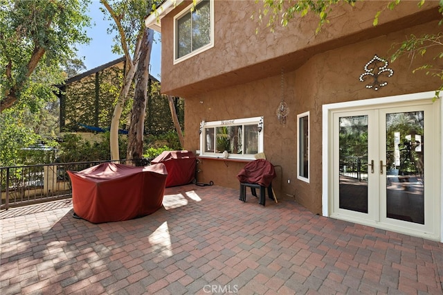 view of patio / terrace featuring area for grilling and french doors