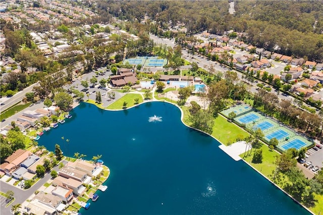 bird's eye view featuring a residential view and a water view