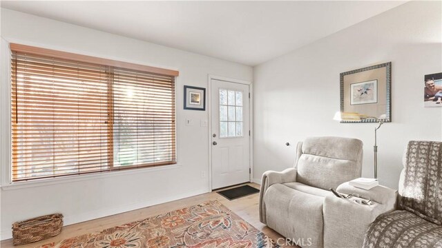 sitting room with wood finished floors