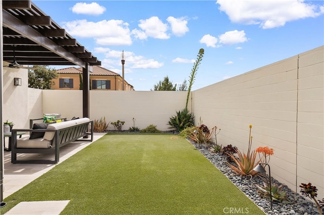 view of yard featuring a patio area, a fenced backyard, and a pergola