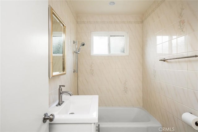 bathroom with vanity and shower / bathtub combination