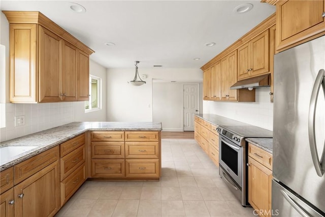 kitchen featuring backsplash, under cabinet range hood, light stone counters, a peninsula, and stainless steel appliances