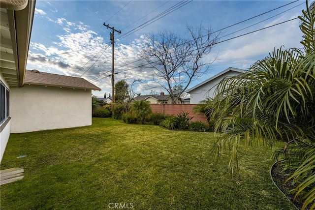 view of yard featuring fence